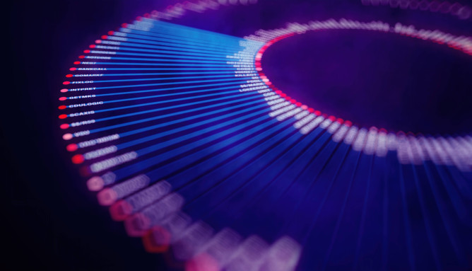woman in smart clothing addressing a group of people in an office