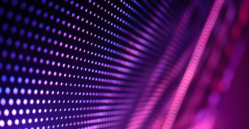 digital pattern of a wall of dots in purple and pink colours